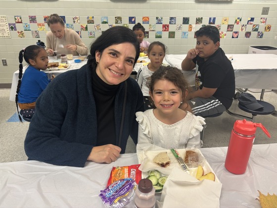 Families smile during the luncheon