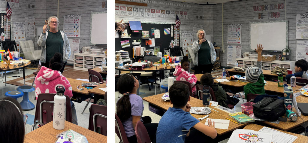 Teacher showing an Egyptian artifact to students