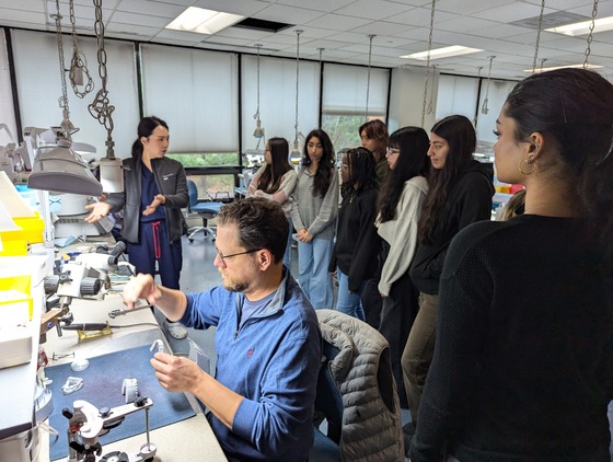 Dental students watched while oral prosthetics were being made