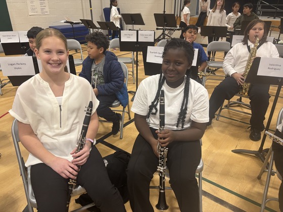 Students smile for the band concert