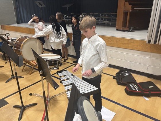 Student practicing for the band concert 