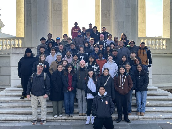 many students standing on steps at Arlington National Cemetery 