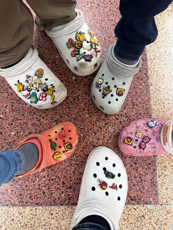 Students and staff wearing Crocs and showcasing their Jibbitz charms