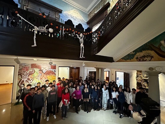 High school students standing together inside Mexican Cultural Institute