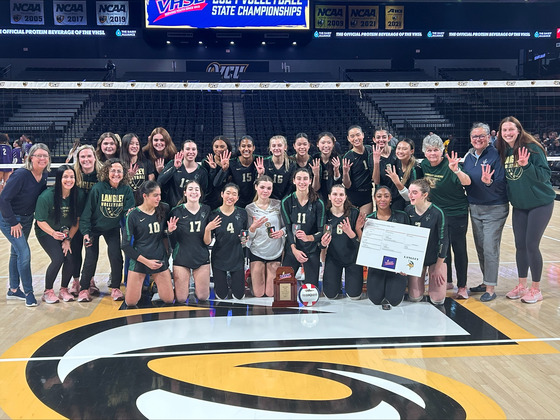 Langley HS girls volleyball team celebrating state championship