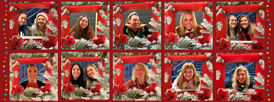 Banner image of many teachers and students posing in a holiday decorated box