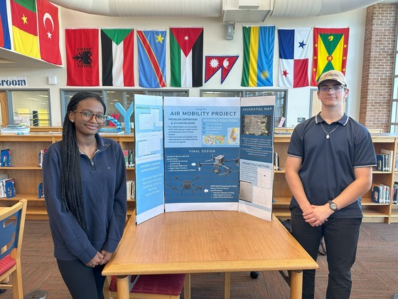 Photo of Global STEM Students Presenting Drone Projects with Applied Calculus, Physics, Computer Science, and Engineering