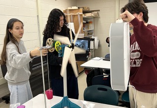 Photo of Global STEM Students Testing Wind Turbine Prototypes
