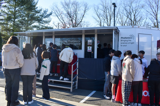Students outside Thorlabs Mobile Photonics lab