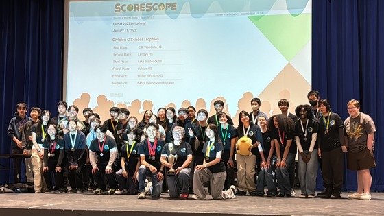 Woodson Science Olympiad team poses with their 1st place trophy