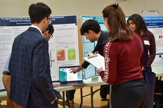 TJ Students Showing Off their Project for Judge