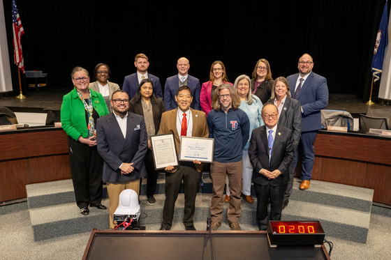 Mike Mukai and Dave Arthur accept Exemplar Award on behalf of TJ