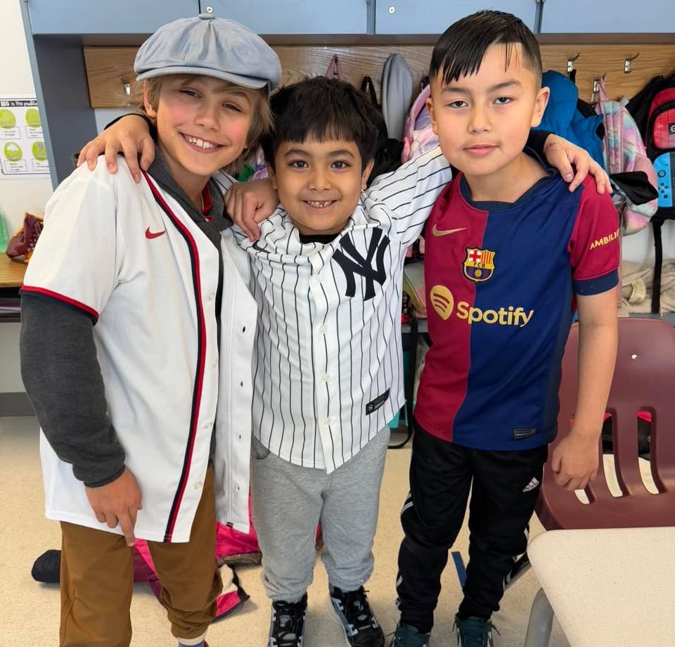 Students pose for Teaming up for Kindness Day 