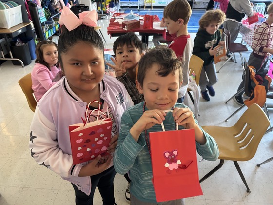 Students decorating bags. 