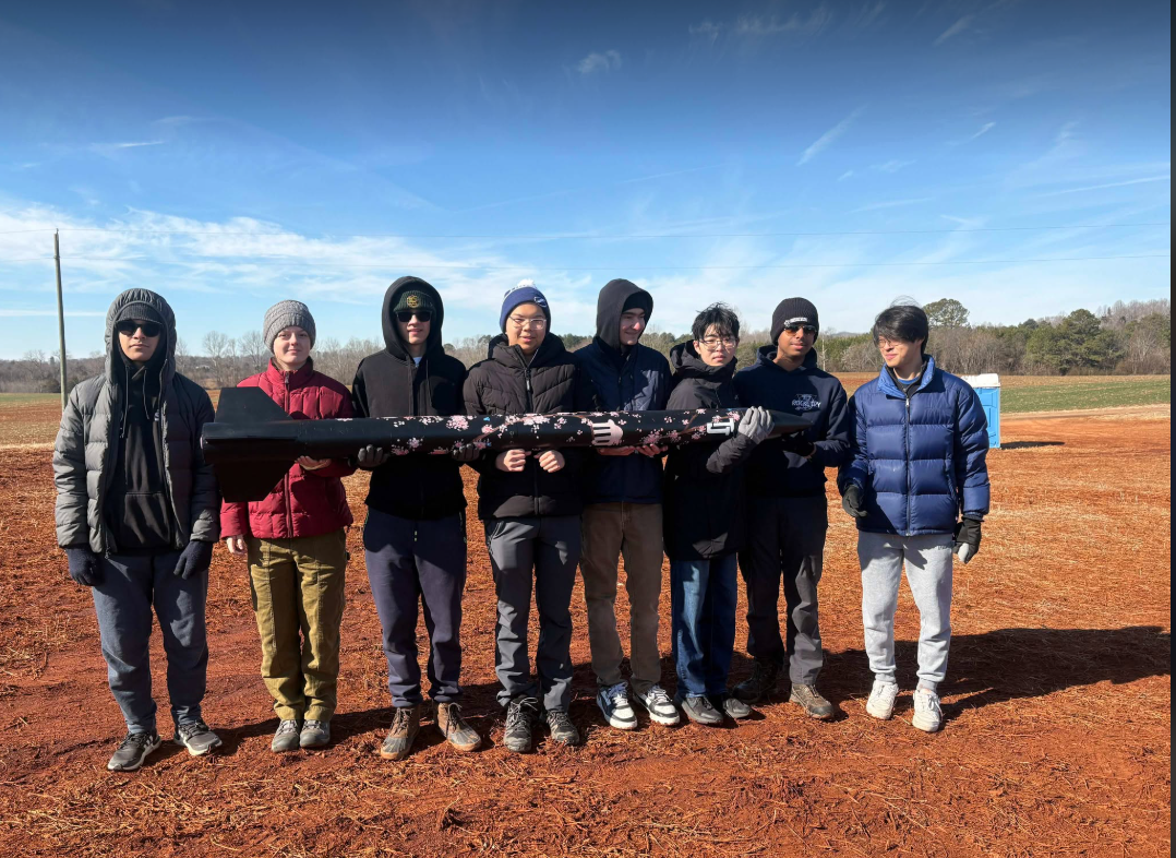 TJ Rocketry club poses with vehicle in Culpepper, Virginia