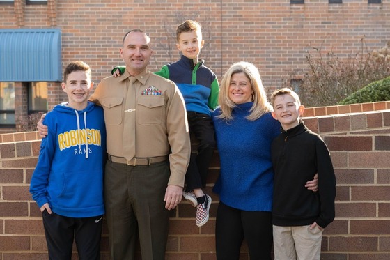 Military family smiling for a photo