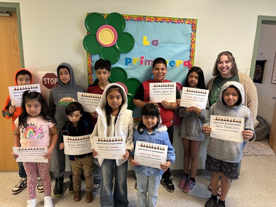 Students pose for our attendance celebration 