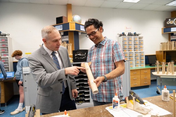 teachers looking at equipment