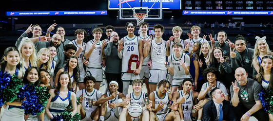 basketball champions with their trophy