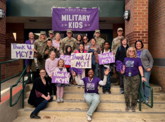 Students and families visit for Purple Up! Day