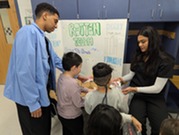 Dental students teaching elementary students