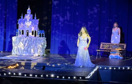 Students walking on stage