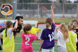 Vienna Youth Soccer coach motivates student participants