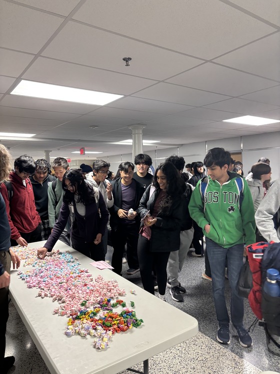 students enjoying taffy on last day before spring break