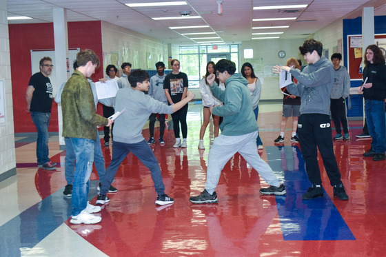 IBEST students acting out a scene from a Shakespeare play