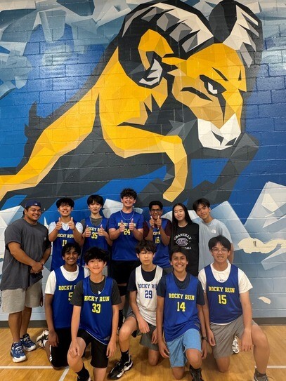 Volleyball players standing and kneeling