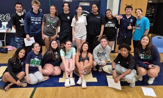 Students sitting and standing