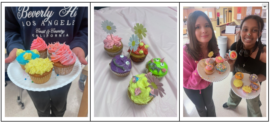 Students holding cupcakes