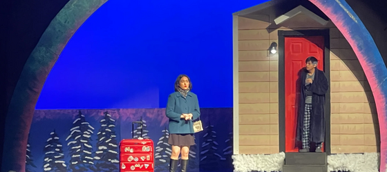 students performing on stage