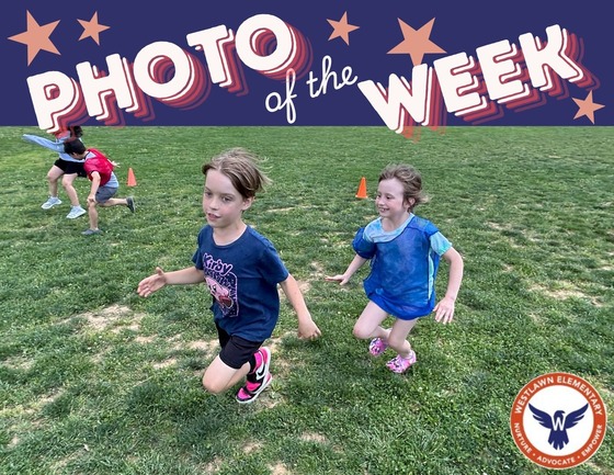 photo of the week: two students playing a field game