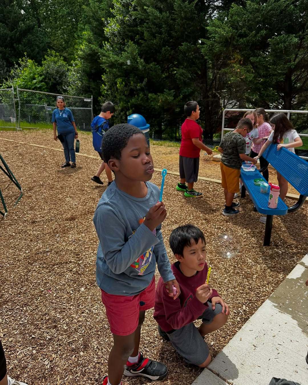 student blowing bubbles