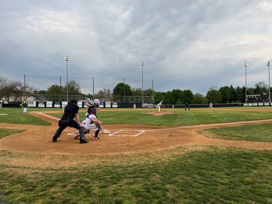 Langley baseball player at bat against Herndon Baseball team