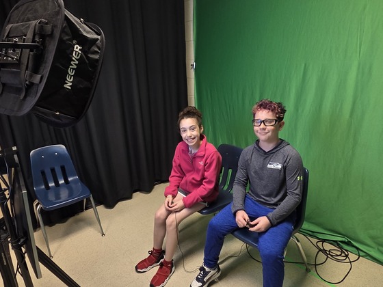 6th grade students preparing to anchor the morning news show on Panda News Network