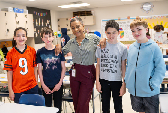 A teacher and four students