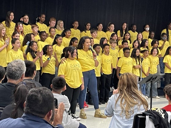 Student who designed the chorus T-shirts