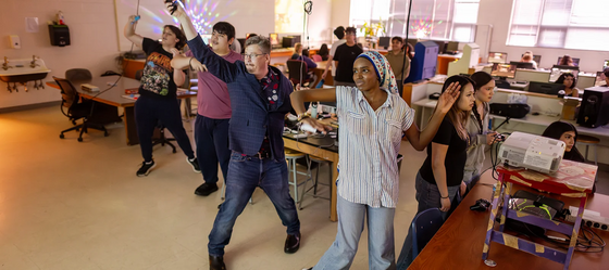 students playing in their arcade