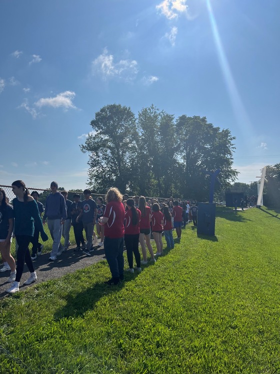 Frost students walking to Woodson for Cavalier Cameo on Friday