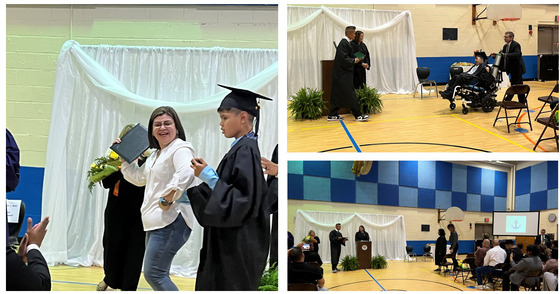 students in gym wearing cap and gown 