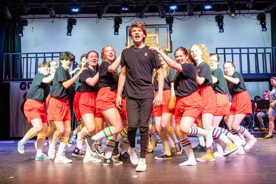 student performing on stage