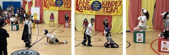 Kindergarten students dressed as dogs and a trainer performing tricks