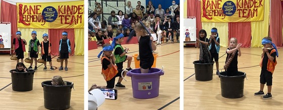 Kindergarten students performing as snake charmers and snakes