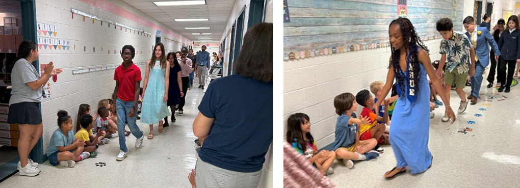6th graders parading through the hallways while younger students and staff applaud