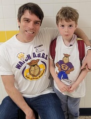 A WATCH DOG parent with his child at HMES.