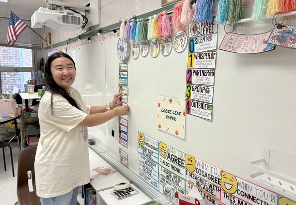Teacher Setting Up Classroom 