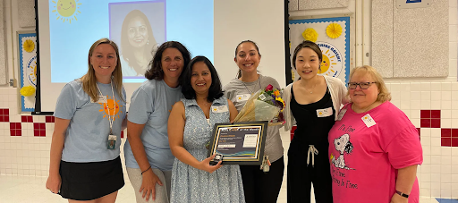 award winner with her peers