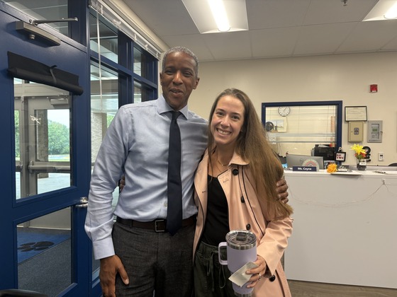 Mr. Stokes and a former student and current Oak Hill parent 